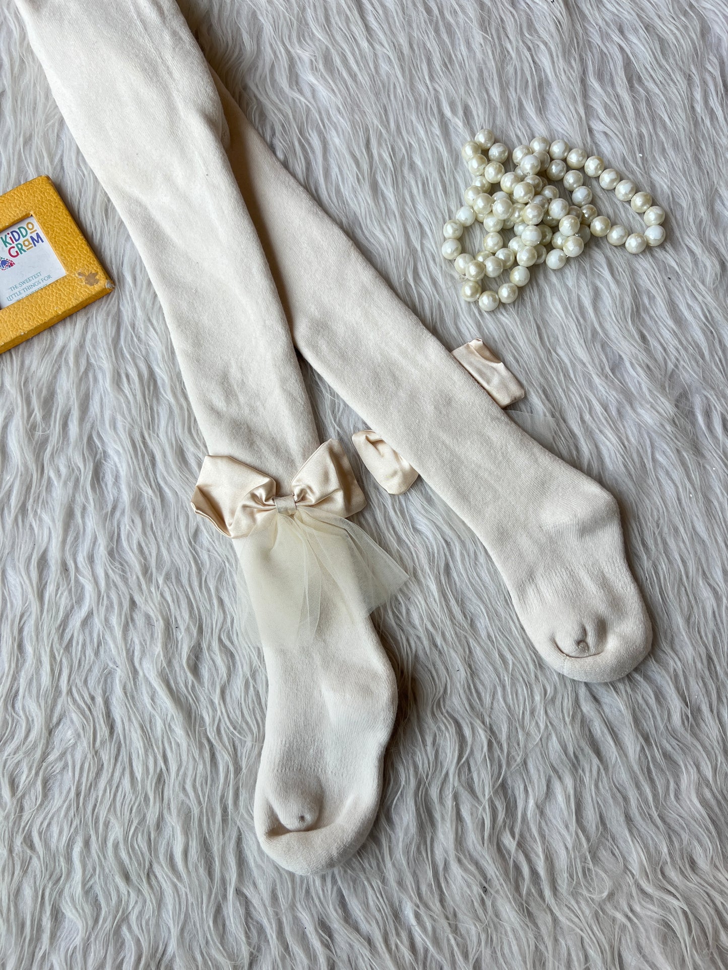 Offwhite bow stocking